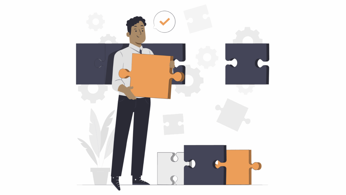 Man putting a piece of a puzzle together